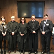 Student teams with the judges, all AUWCL professors